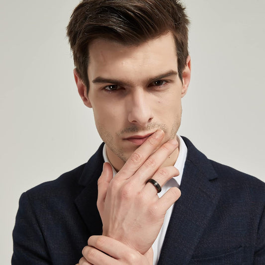 Black band ring made from durable black Tungsten, available in 4mm, 6mm, 8mm, and 10mm widths.