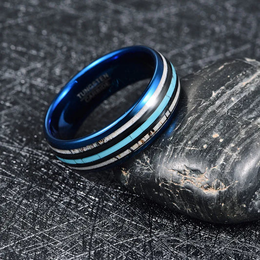 Wedding rings blue featuring a blue band with turquoise and deer antler inlays.