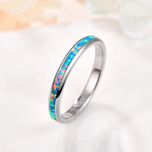 Women's opal jewelry featuring a domed silver Tungsten band in 3mm.