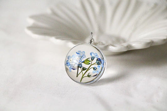 Collier de fleurs en verre bleu Myosotis