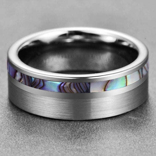 Mens silver wedding rings crafted with a natural abalone shell inlay.