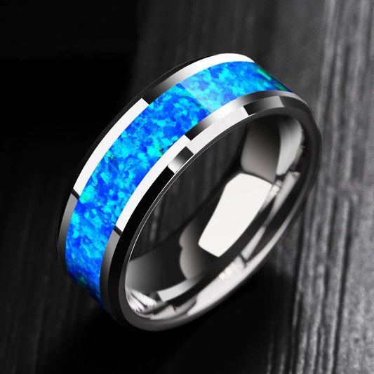 Polished silver Tungsten men's ring with a natural blue opal inlay and beveled edges, shown on a black background.