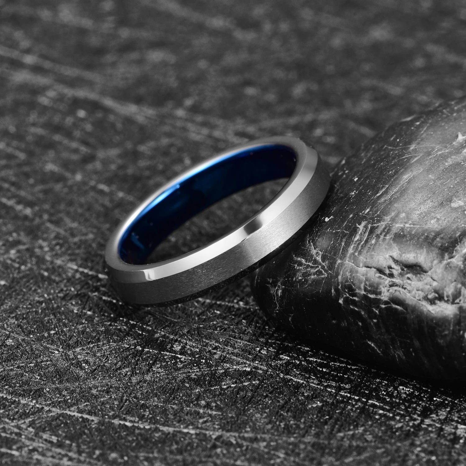 Beveled edge Silver Tungsten ring with polished blue interior, 4mm width, comfort fit.