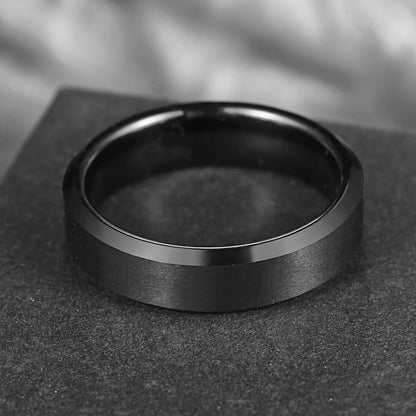 6mm black Tungsten men's ring featuring a brushed outer finish with sleek beveled edges.