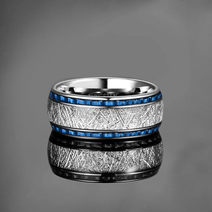 8mm silver Tungsten ring with a genuine meteorite and blue carbon fiber inlay, displayed on a reflective surface.