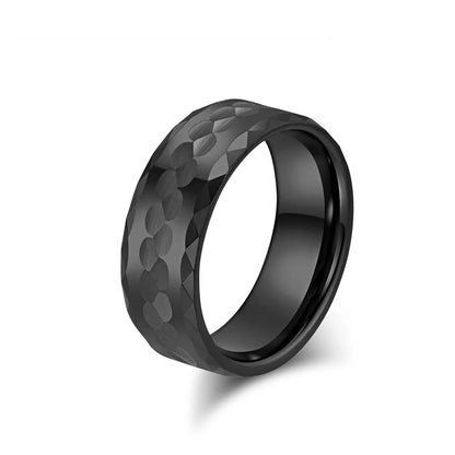 8mm black Tungsten ring featuring a hammered pattern with light-catching faceted edges for a bold, contemporary look.