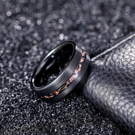 8mm flat black Tungsten ring with a brushed finish and an inlay of black sandstone, copper flakes, and real Moon dust sourced from lunar meteorites.