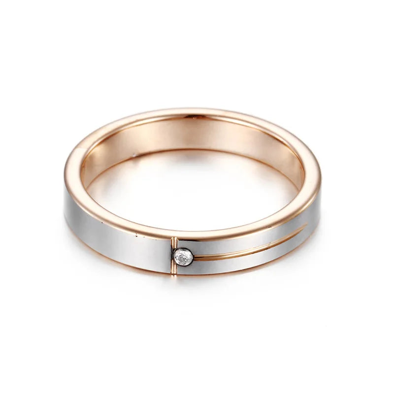 Rose gold and silver Tungsten ring with a simple flush-set diamond accent and a sleek, polished finish for a timeless and elegant style.