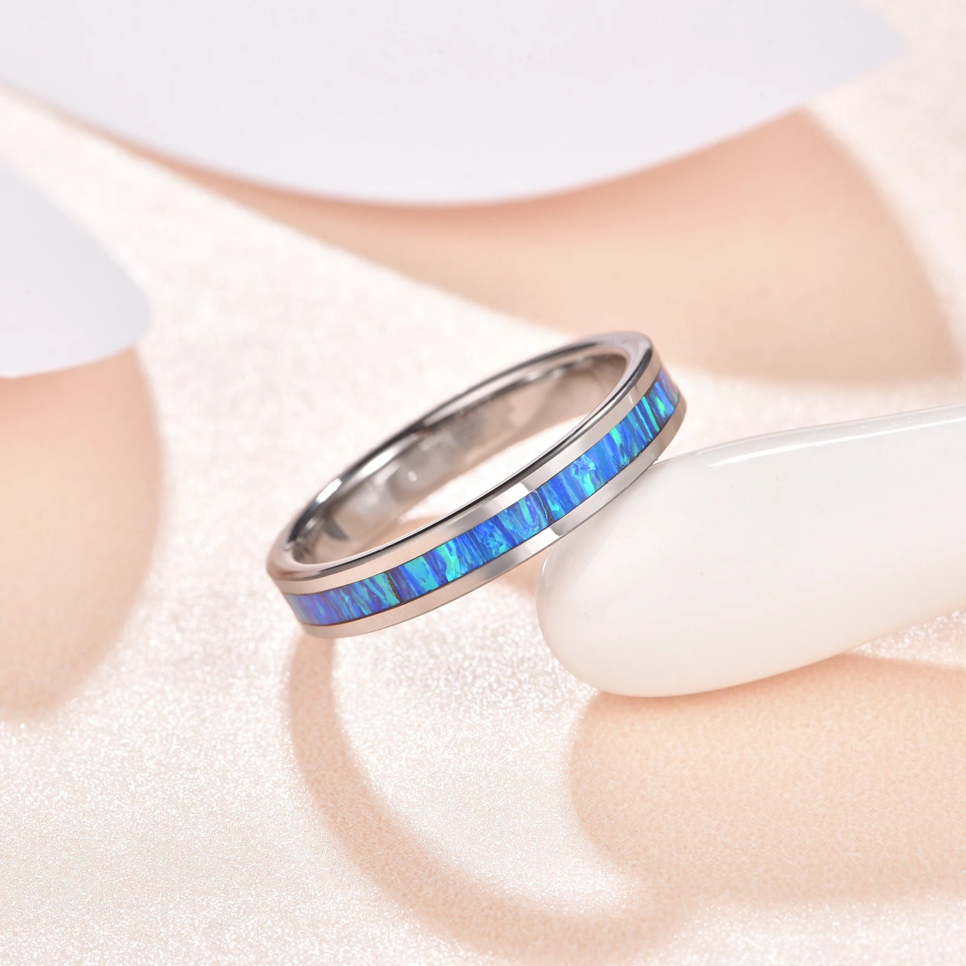 Polished Tungsten women's wedding ring with a 4mm blue opal inlay