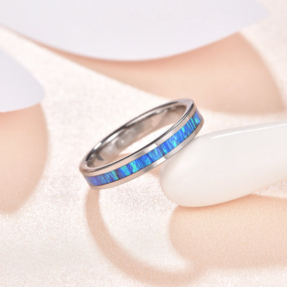 Polished Tungsten women's wedding ring with a 4mm blue opal inlay