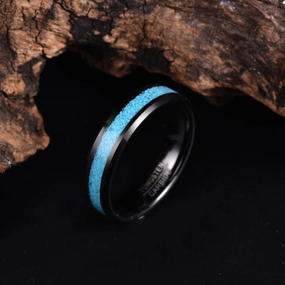 Turquoise stone ring for men with a polished black Tungsten flat band.