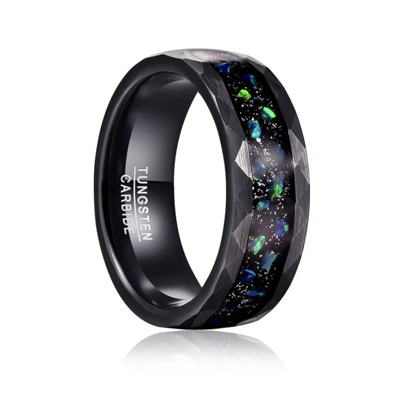 Close-up of black Tungsten ring with blue opal galaxy inlay and hammered edges