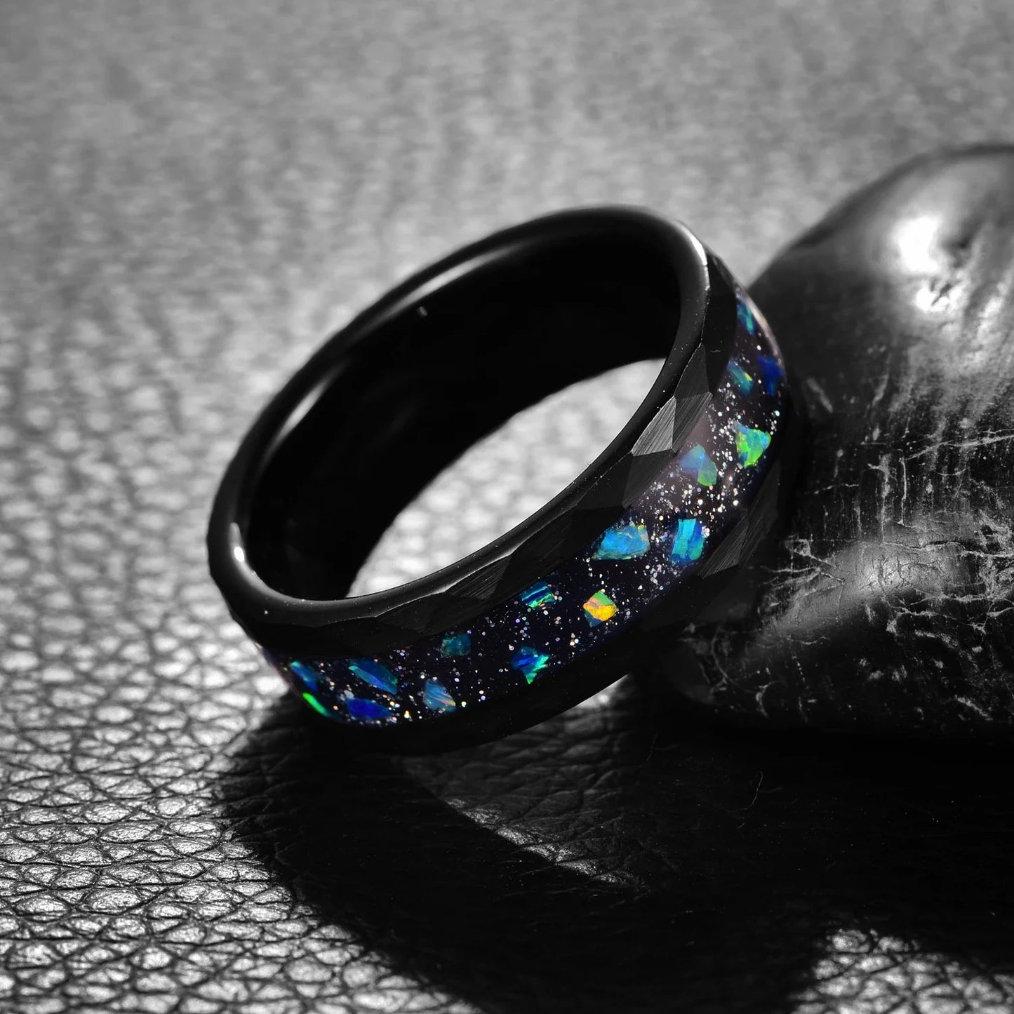 Black Tungsten ring with blue opal galaxy-inspired inlay, hammered edges, 8mm width