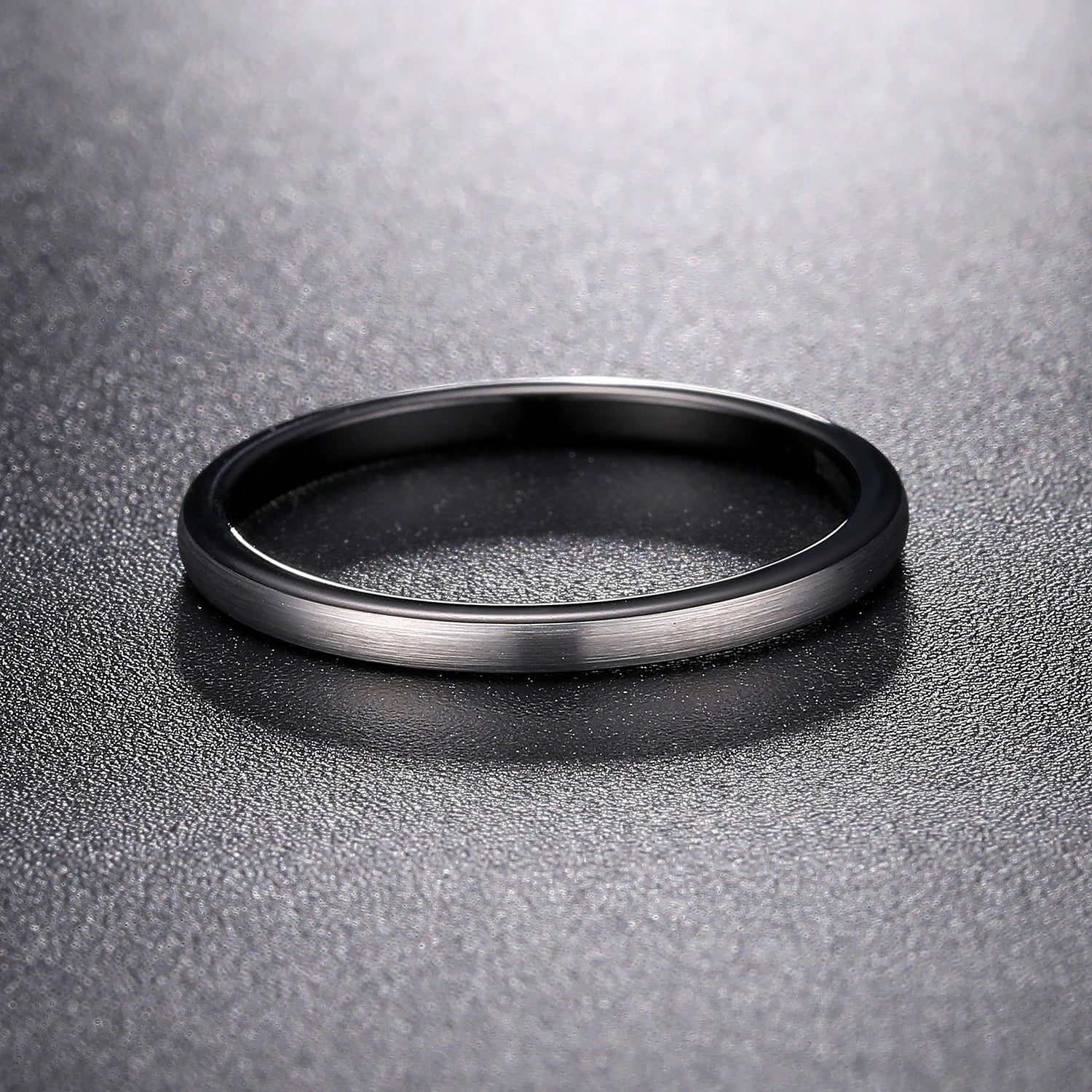 Black and silver wedding rings, with a domed band in 2mm width.