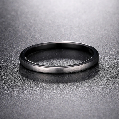 Black and silver wedding rings, with a domed band in 2mm width.