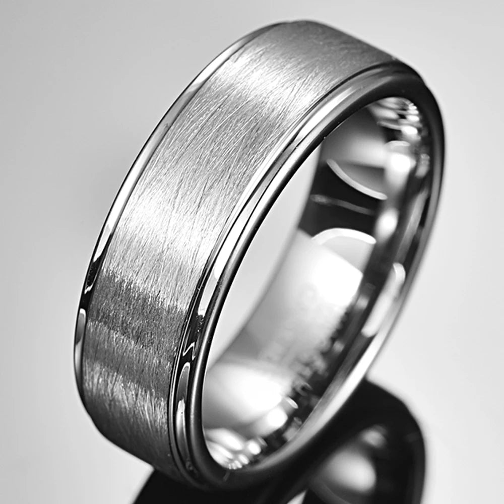 Brushed silver Tungsten men's ring with polished stepped edges, side view