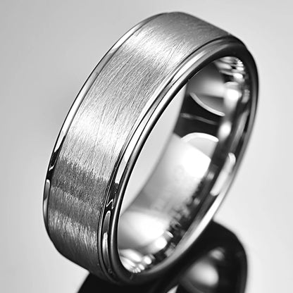 Brushed silver Tungsten men's ring with polished stepped edges, side view