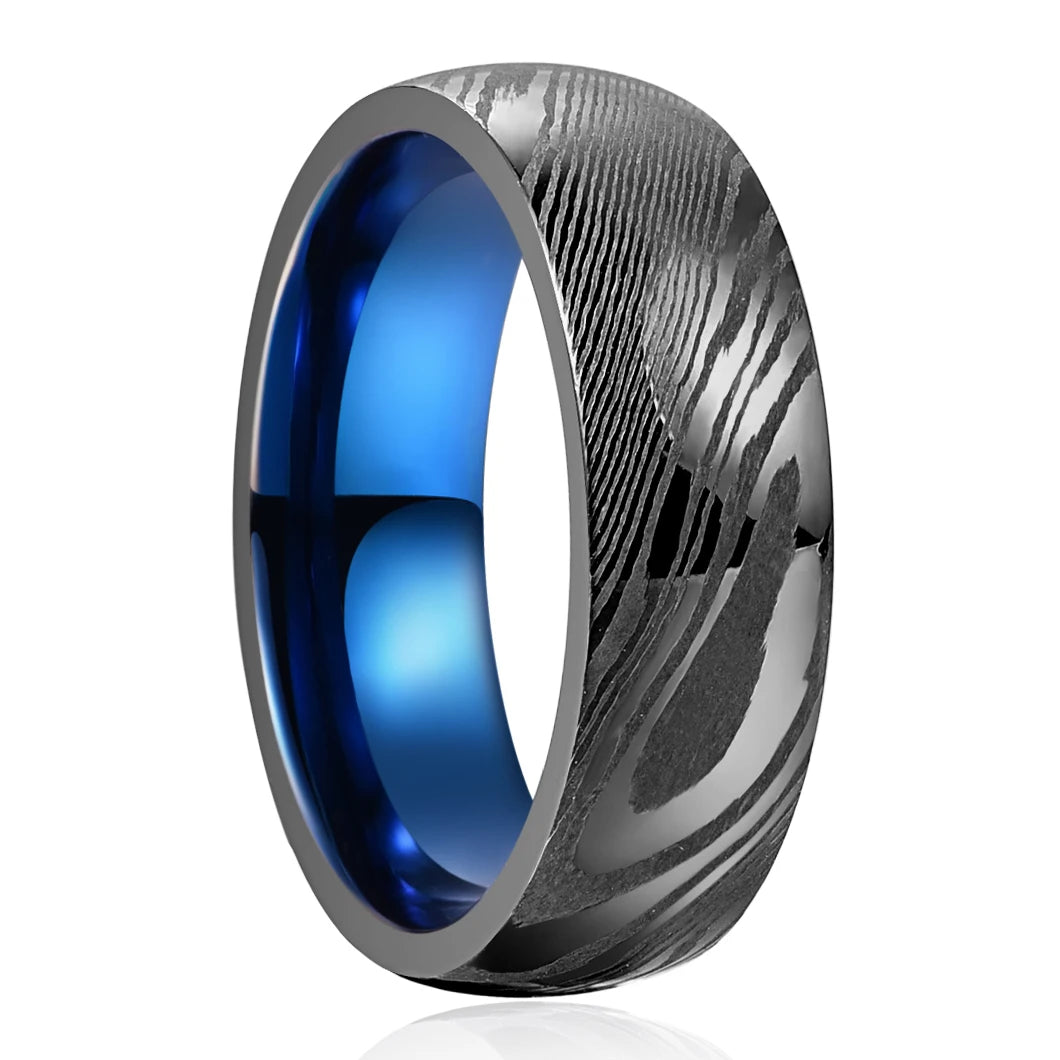 Damascus Steel ring with a black exterior and blue interior.