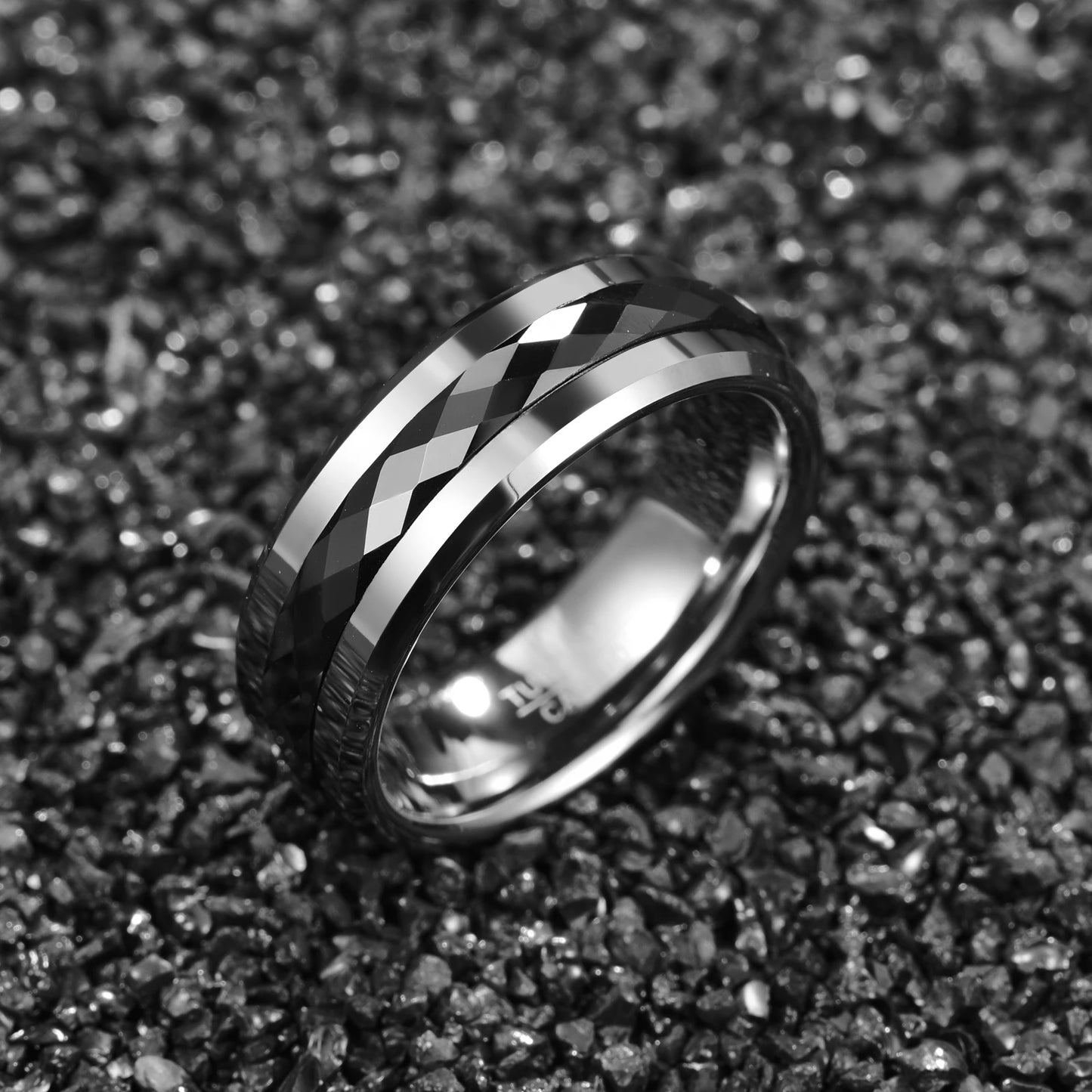 8mm men's tungsten spinner ring with faceted black center stripe.