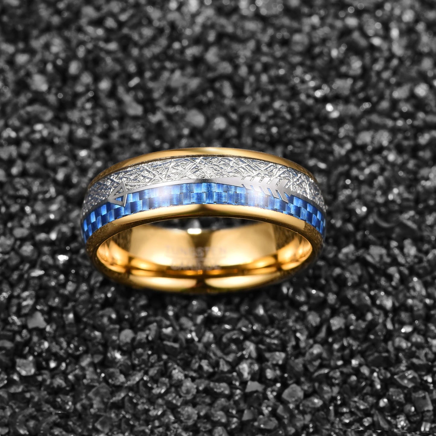 Side view of a gold tungsten ring with meteorite and blue carbon fiber inlay featuring an arrow design