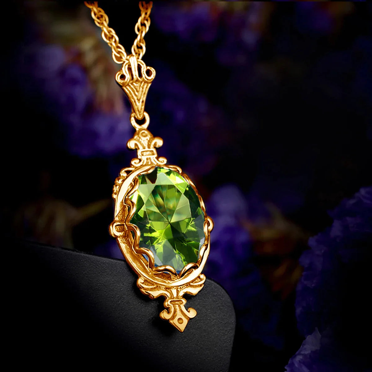 Gold gem necklace featuring a natural faceted peridot in an elegant decorative setting.