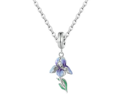 Iris pendant with delicate purple petals, sterling silver details, and a slender green stem.