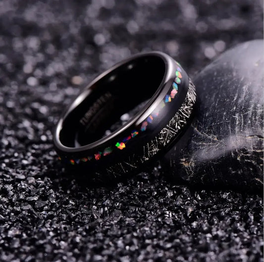 Mens meteorite ring with a Tungsten band inlaid with Gibeon meteorite and Black Opal.