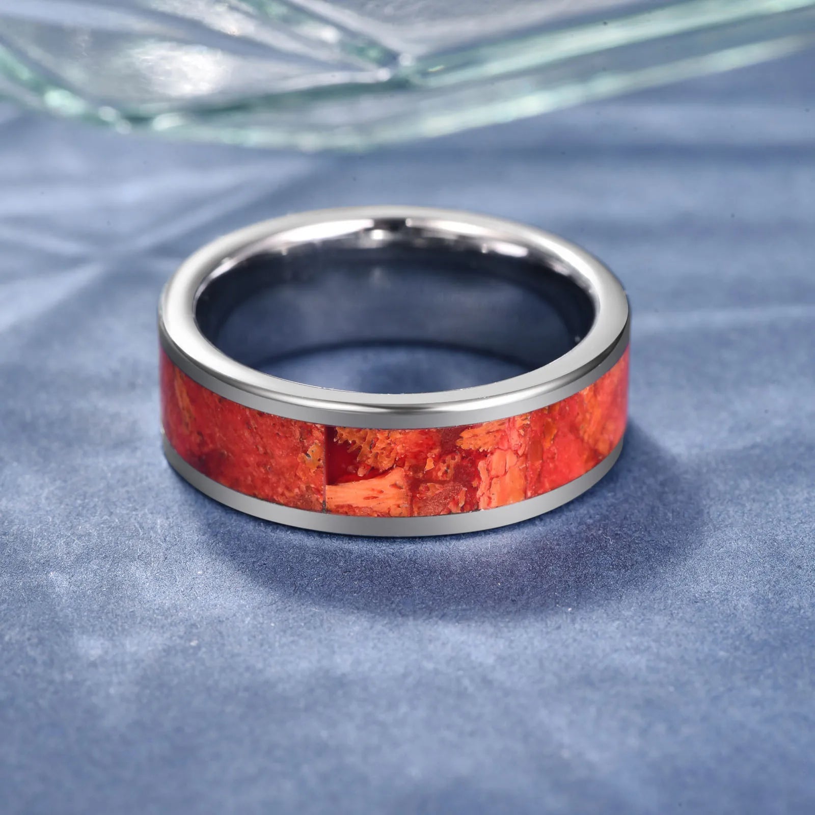 Men’s 8mm silver tungsten ring with a striking red agate inlay, crafted to reflect the rich tones and organic patterns of the natural world.