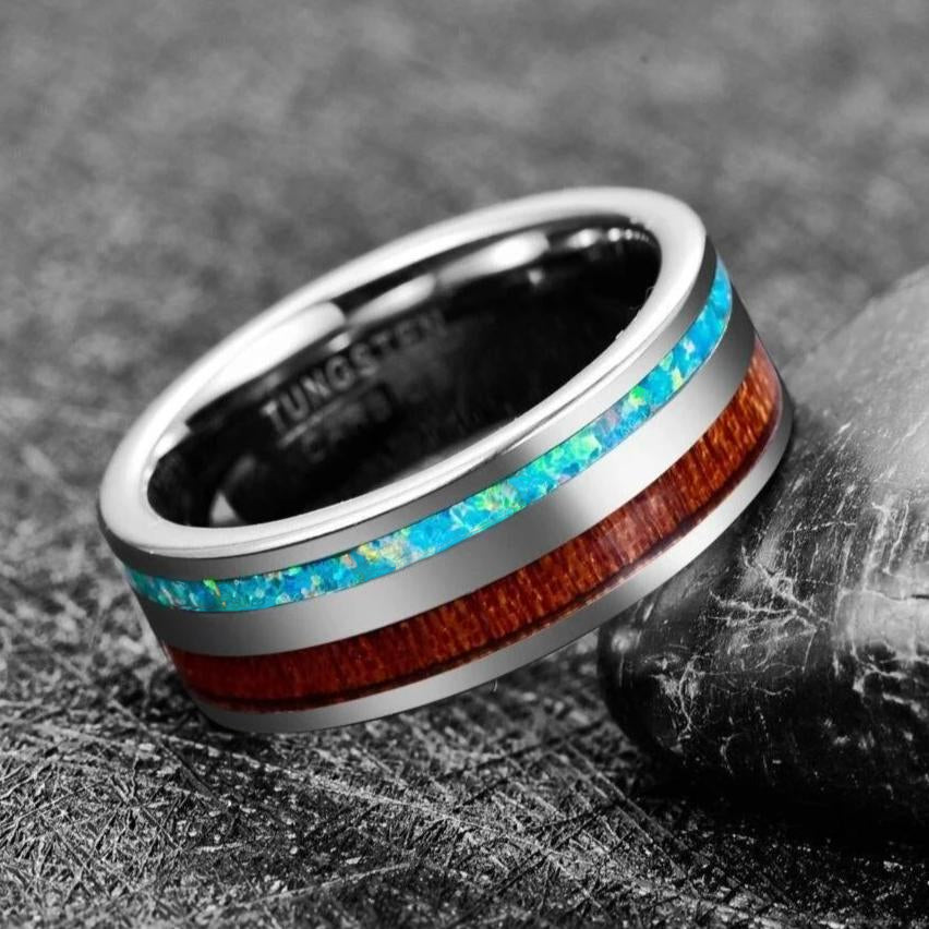 Opal band crafted from Tungsten with blue opal and Koa wood inlay.