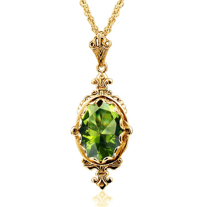 Gold peridot necklace with a natural peridot jewel framed by an antique-style setting.