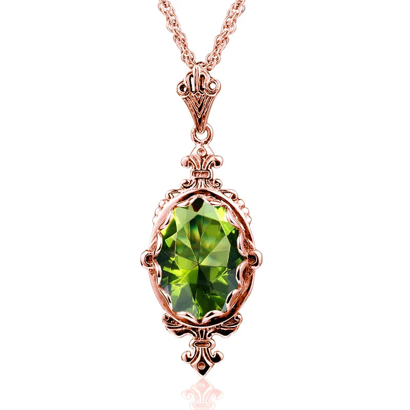 Rose gold peridot necklace with a faceted oval green gemstone in a warm vintage-inspired pendant setting.