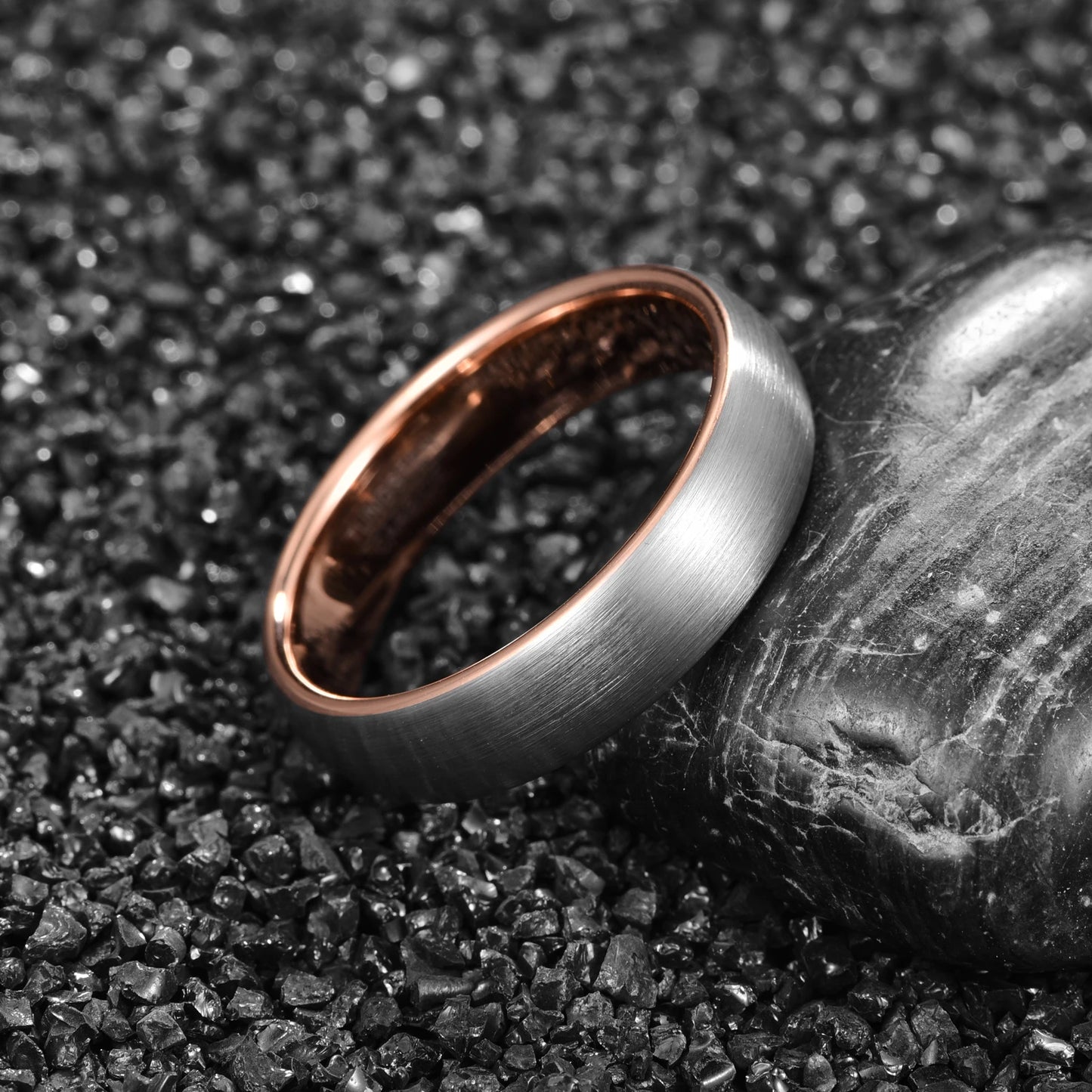 6mm unisex Tungsten ring featuring a brushed silver exterior and polished rose gold interior, placed on a black background.