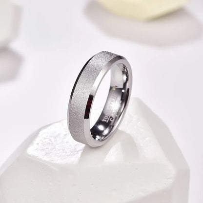 Silver wedding bands for men, with frosted exterior and polished bevels.