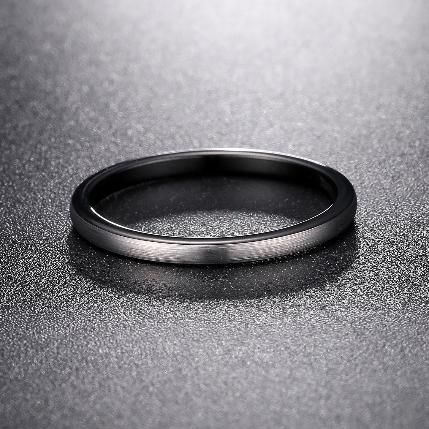 Sleek 2mm Tungsten ring in silver and black with a brushed finish