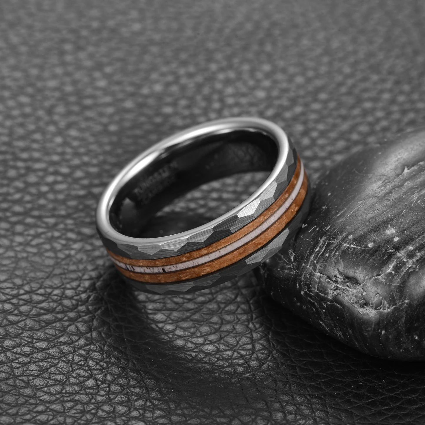 Men's tungsten ring with whiskey barrel oak and antler inlay, hammered edge