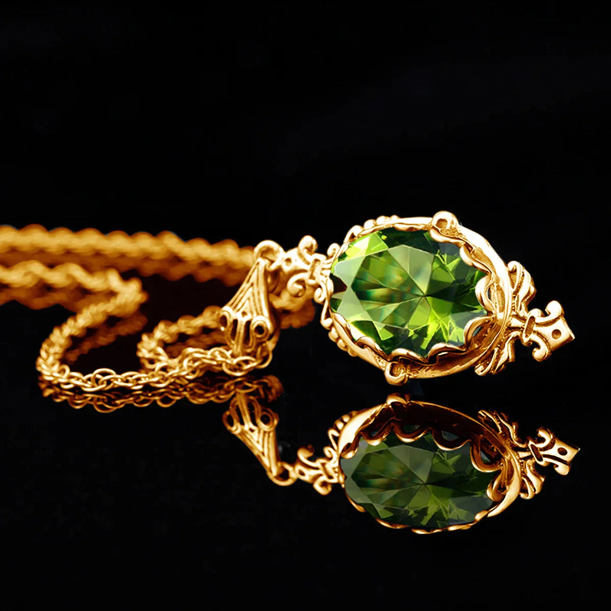 Yellow gold peridot necklace with a vivid faceted oval gemstone in an ornate antique-inspired setting.