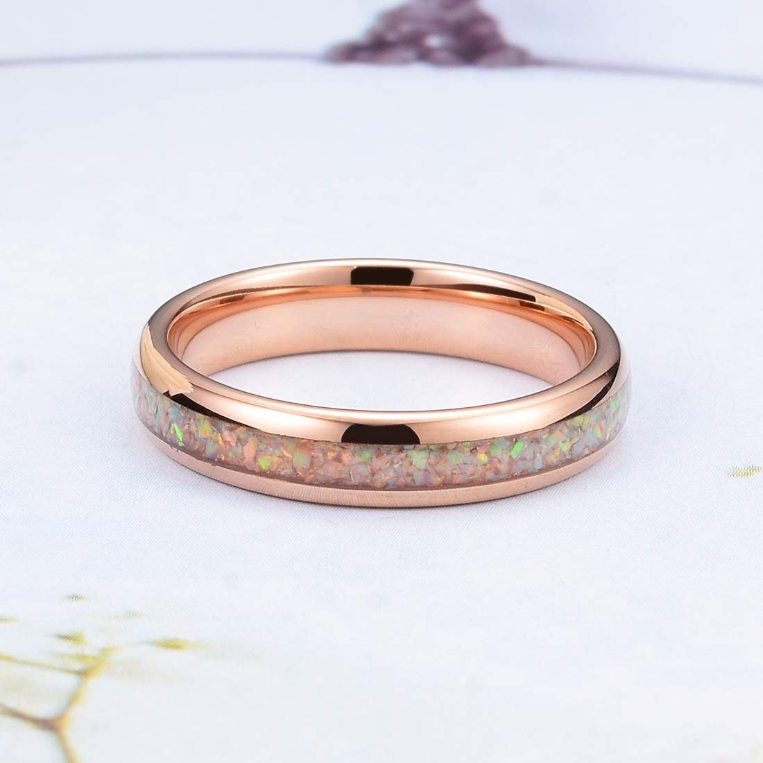 4mm women's wedding band in rose gold Tungsten, domed with white fire opal inlay and comfort fit interior.