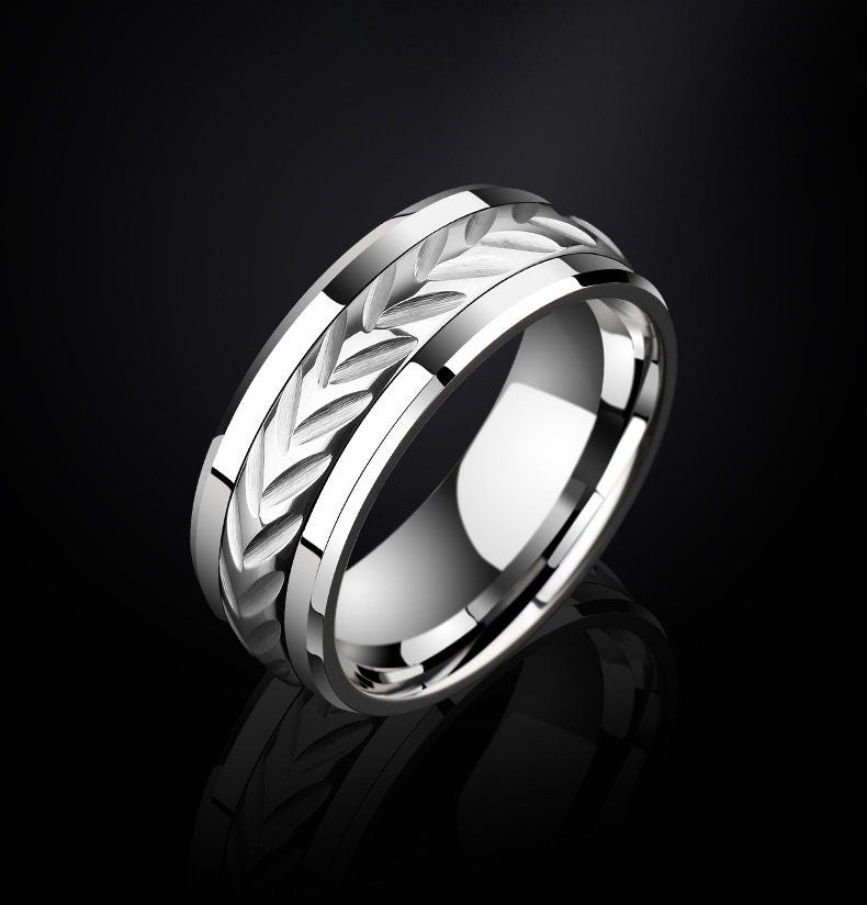 8mm silver Tungsten men's spinner ring with polished edges and intricate etched leaf design.