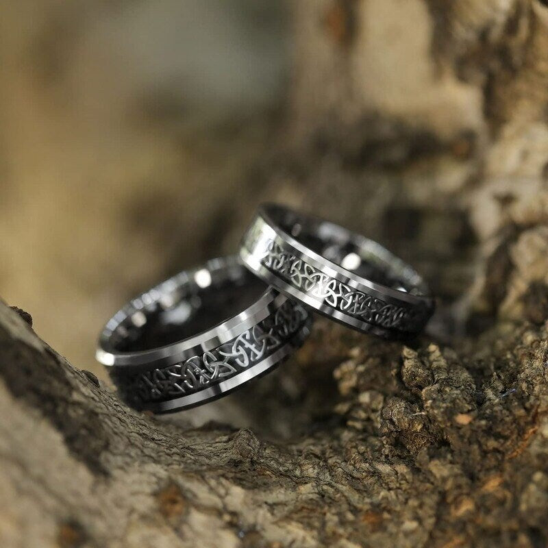 Celtic wedding band sets featuring polished silver Tungsten with beveled edges.