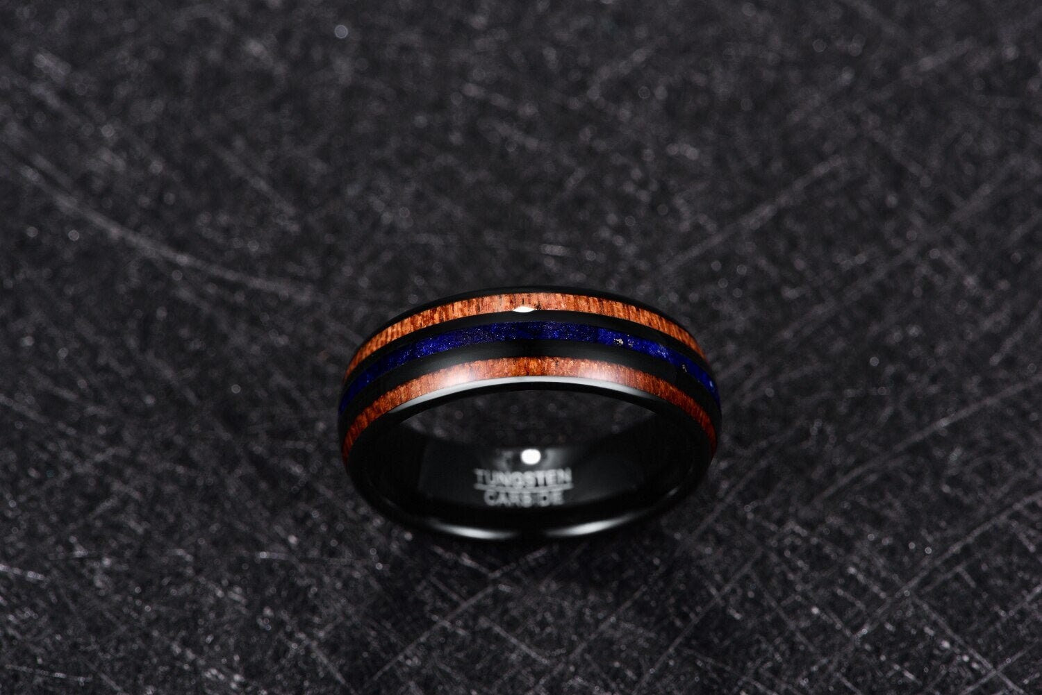 Lapis Lazuli mens ring with a black Tungsten band and vibrant blue gemstone inlay.