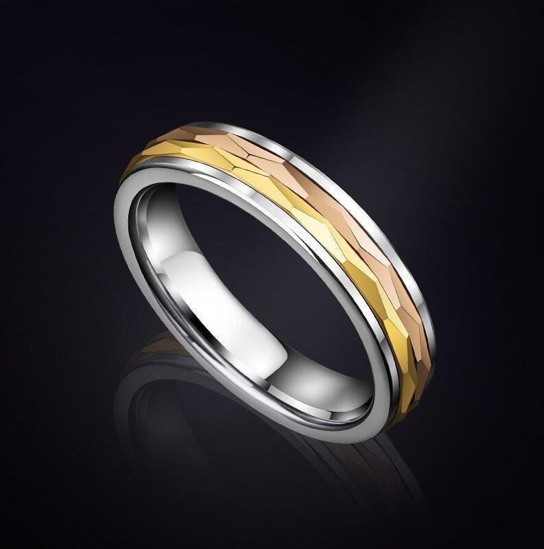 5mm men's Tungsten spinner ring featuring two center spinners in gold and rose gold Tungsten with a polished silver Tungsten band.