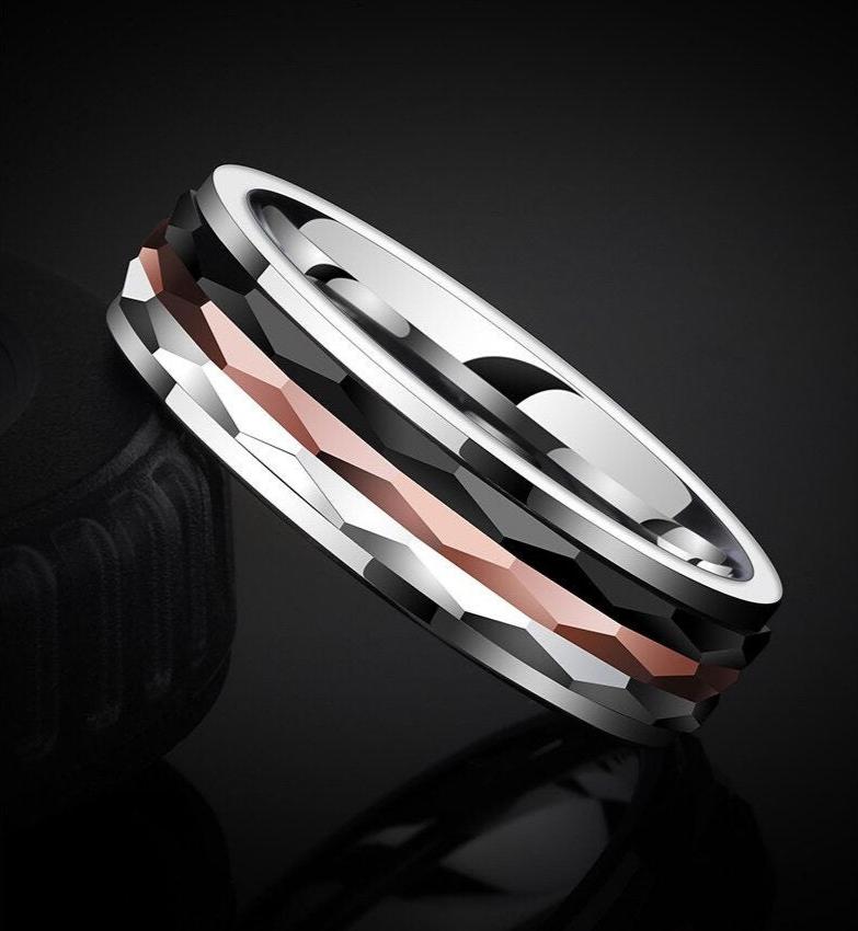 6mm men's Tungsten spinner ring featuring three center spinners in silver, bronze, and black Tungsten with a polished silver Tungsten band.