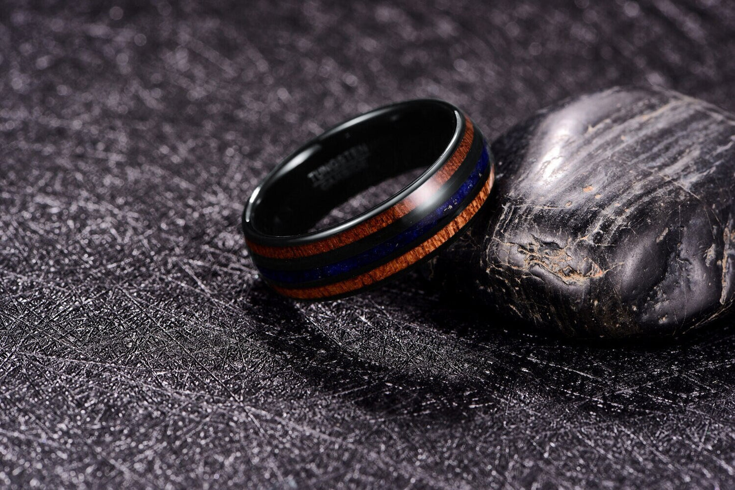 Wood and stone rings with black Tungsten, featuring Koa wood and Lapis Lazuli inlay.