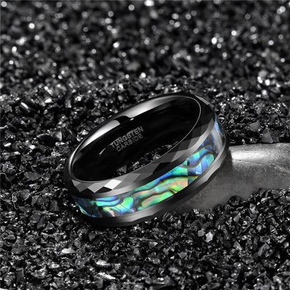 Abalone in jewelry crafted as a Tungsten men’s ring with abalone shell inlay.