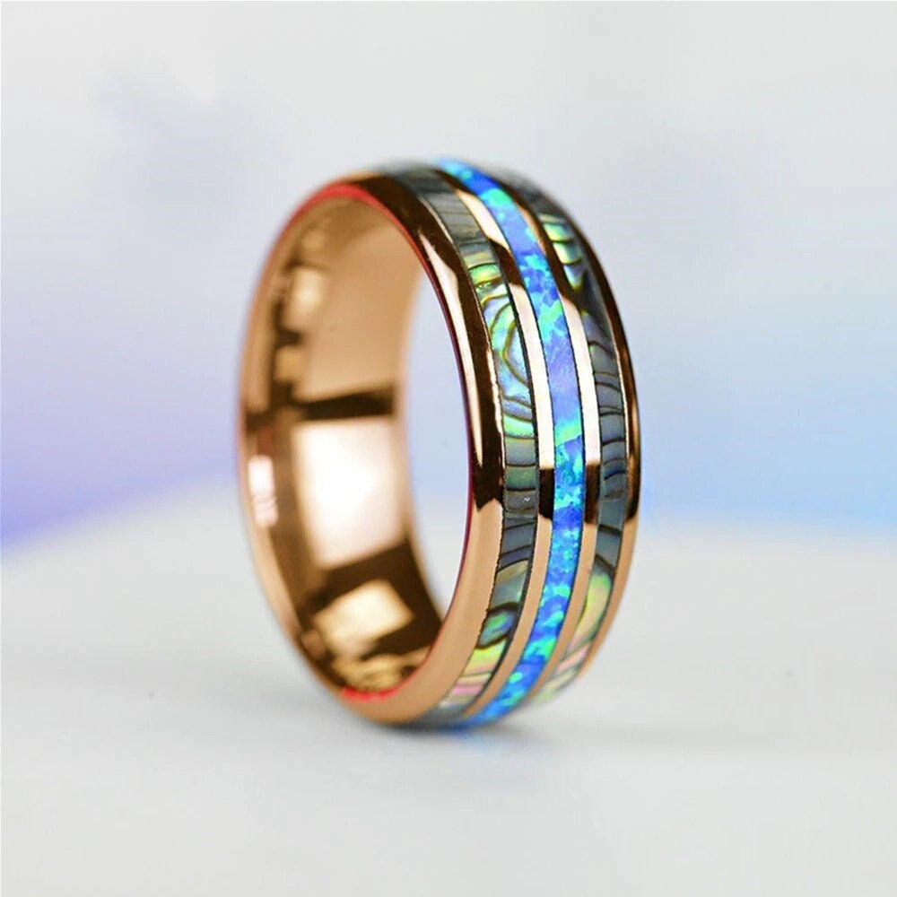 Abalone shell ring with opal inlay set in rose gold Tungsten.