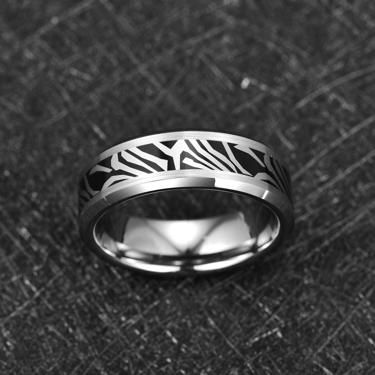 Animal print ring featuring a zebra stripe design on a black and silver Tungsten band.