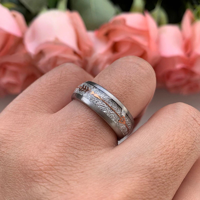 Authentic meteorite rings with a silver Tungsten band and Gibeon meteorite inlay.