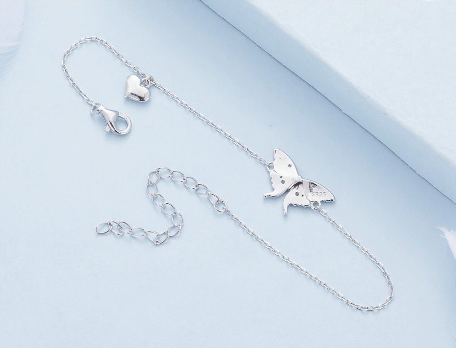 Back view of the moth charm showing the 925 sterling silver stamp.