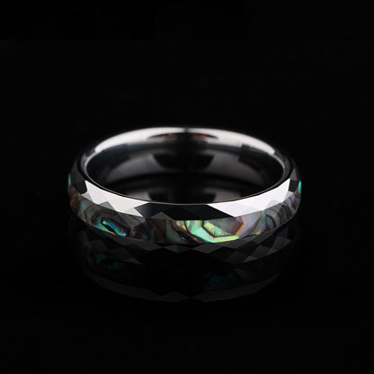 Beach rings crafted with a 5mm silver Tungsten band and vibrant abalone shell.