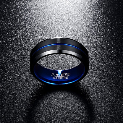 Black and blue mens wedding ring made from brushed black Tungsten with polished blue Tungsten interior and stripe.